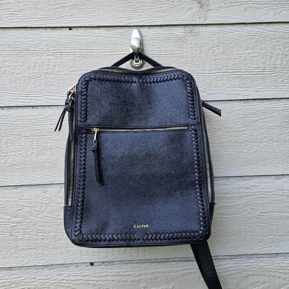 Calpak Kaya black faux leather laptop travel backpack